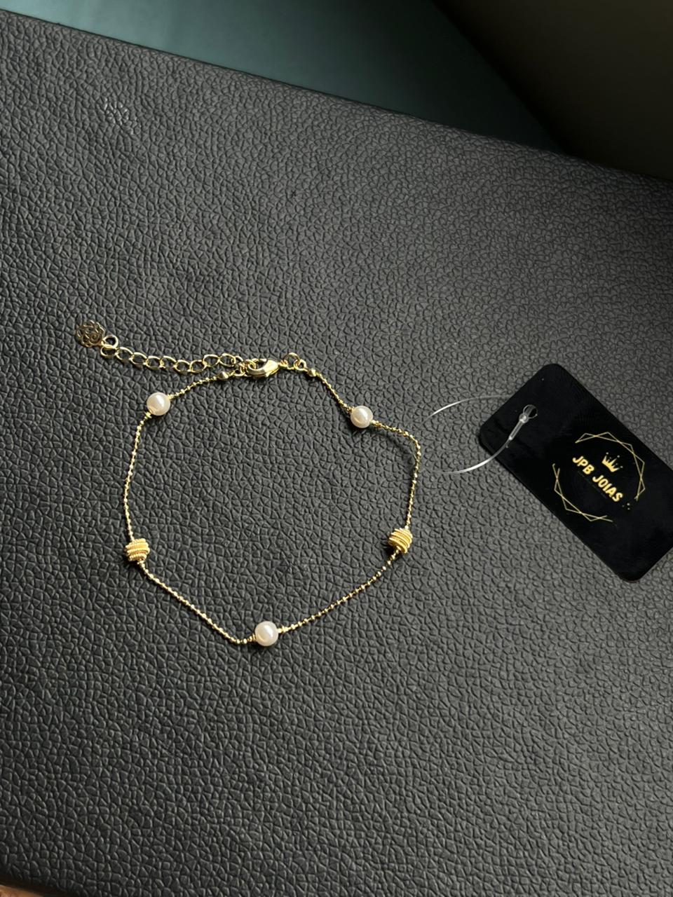 PULSEIRA BOLINHA COM PÉROLAS CRUZADA + EXTENSOR